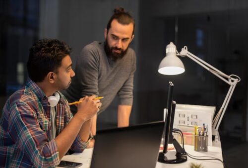 creative-team-with-computer-working-late-office_380164-204513