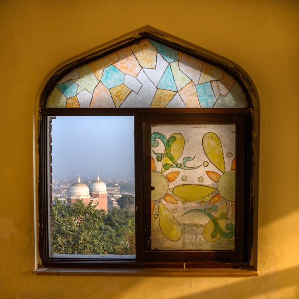 Veiw of Qasim Bagh gate through an ornate window in Multan, Pakistan.